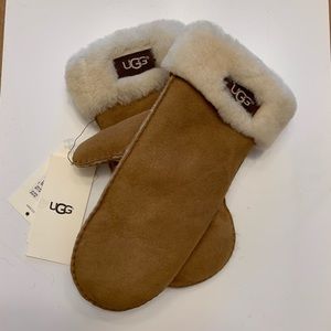 Tan UGG wmns mittens.